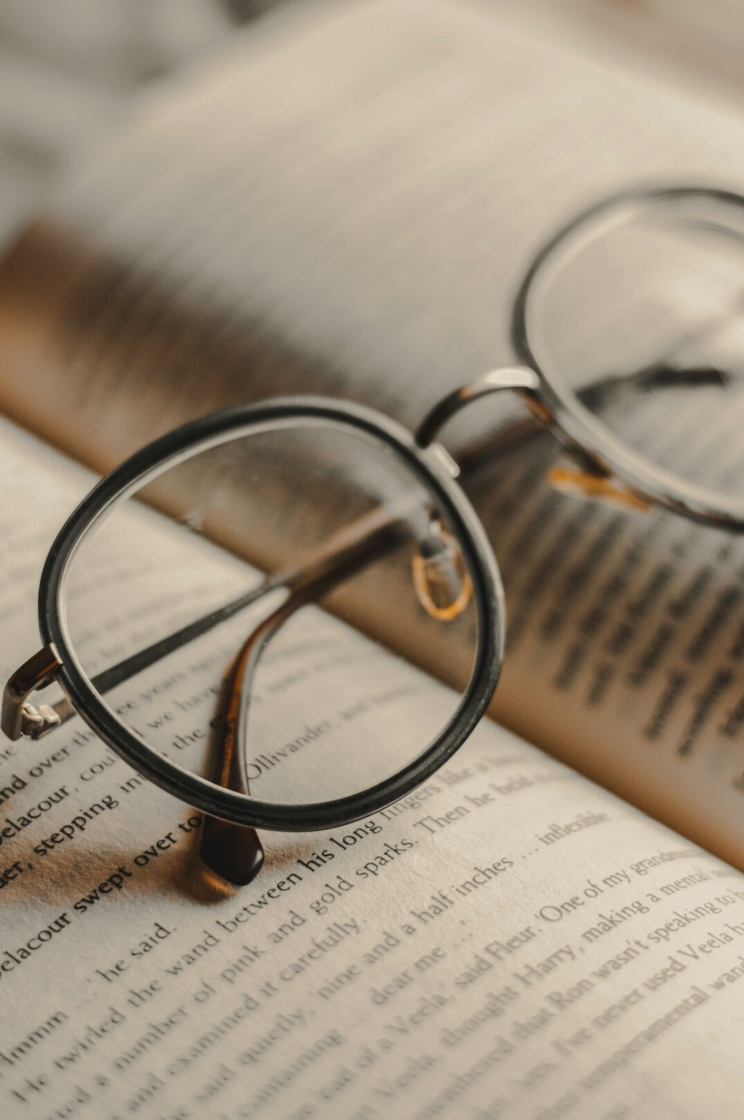 Open book with reading glasses