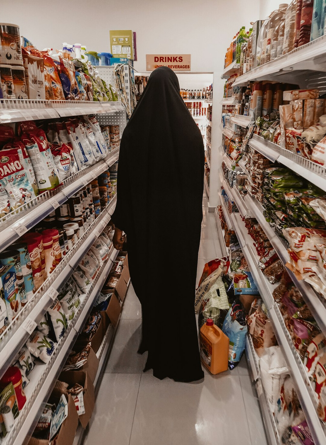 store detective chasing thief in supermarket